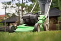female-legs-woman-using-lawn-mower-content